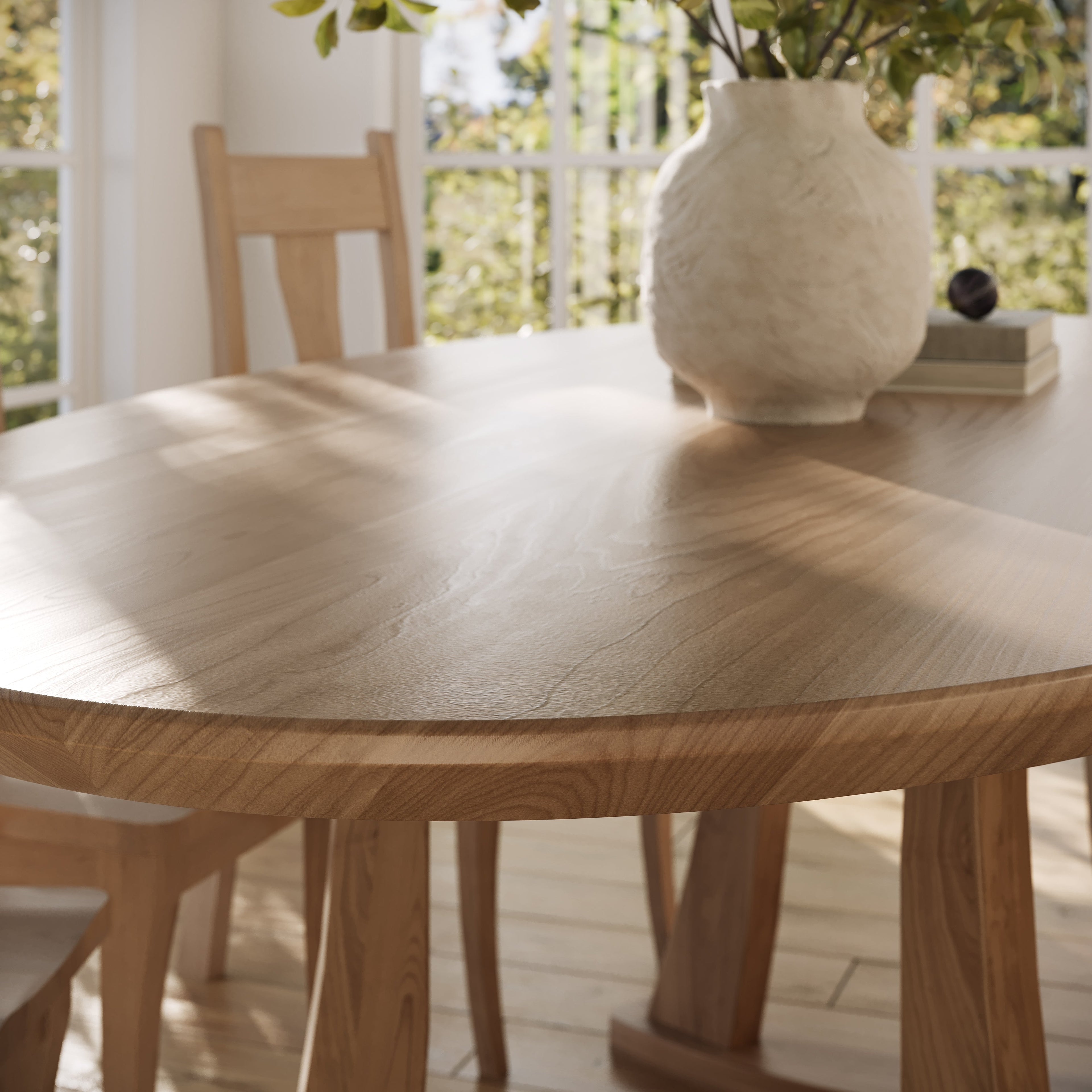 The Quinn Oval Dining Table